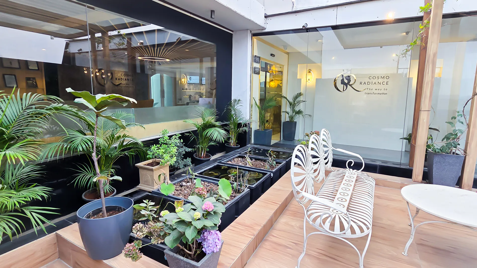 Relaxing outdoor garden seating with lotus ponds