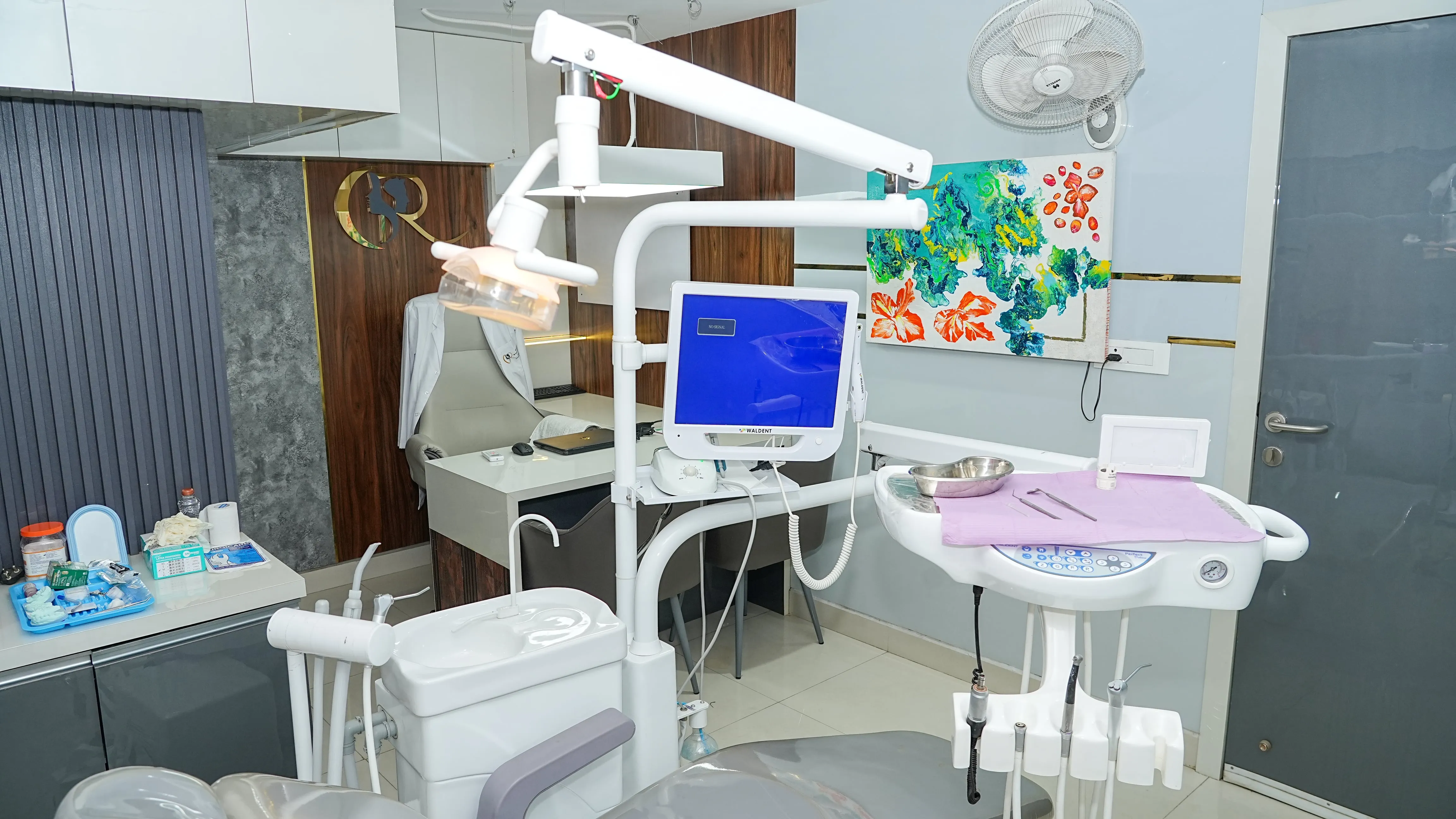 Advanced dental wing with high-end chair and remote x-ray