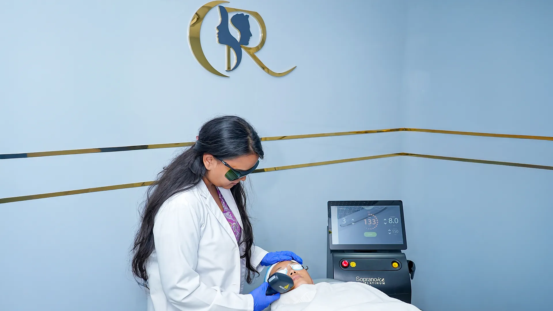 Dr. Anusha Meka performing laser hair reduction